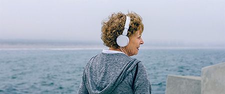 Senior woman headphone.